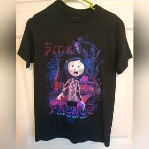 Coraline the pink t-shirt